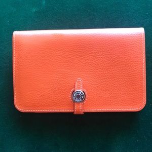 Orange faux leather wallet